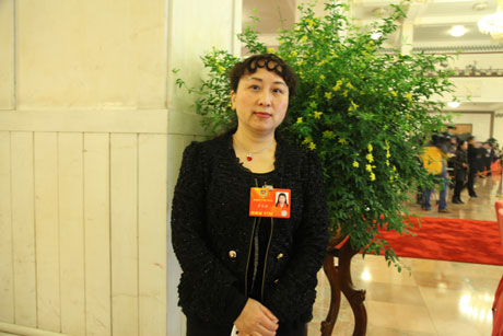 罗良娟：应对人口老龄化 津贴制度需完善