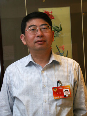 全国政协委员、海南省政协副主席、海南省科技厅厅长王路
